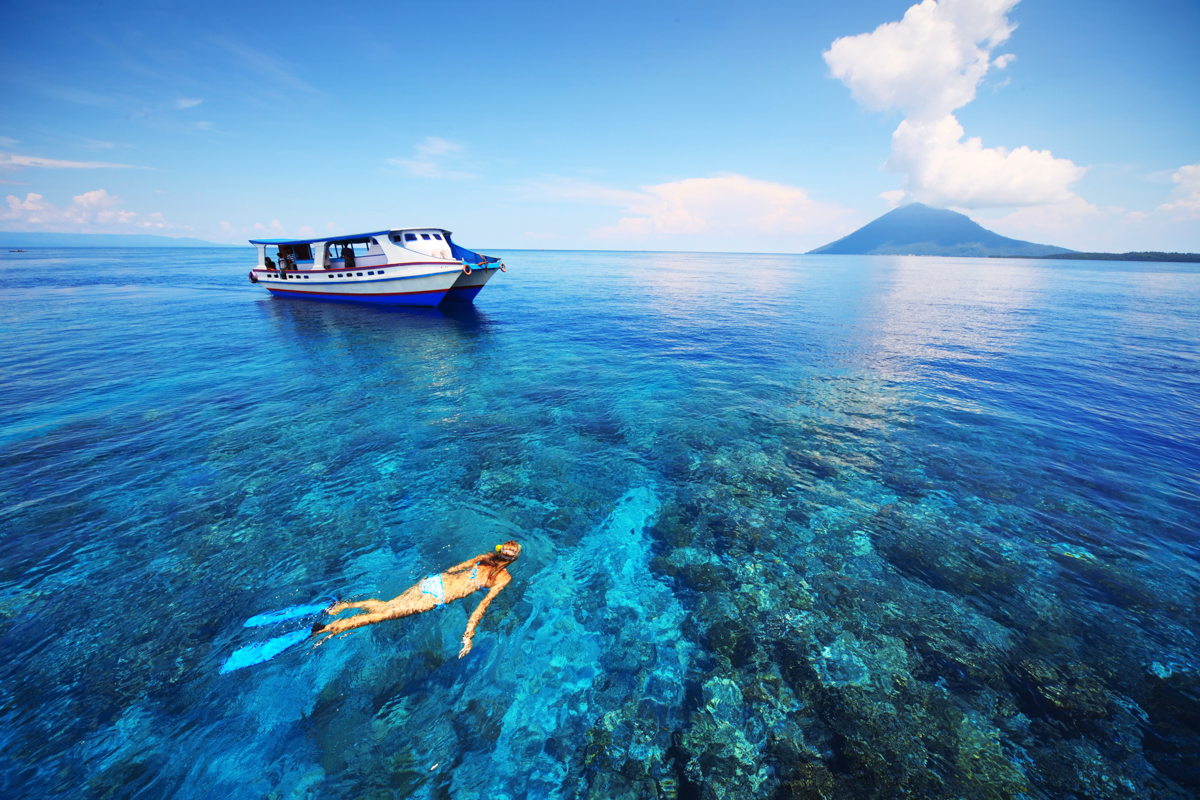 Female snorkelling in Indonesia