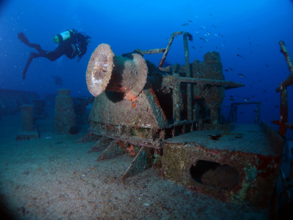 Wreck and diver in Malta