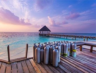 Scuba tanks and the Maldives sunset