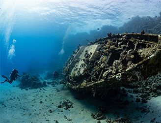Diver exploring a shipwreck in Egypt