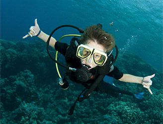 Young boy scuba diving