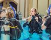 Male instructor teaching dive students in a pool in Egypt