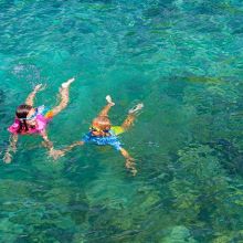 Kids swimming in the sea