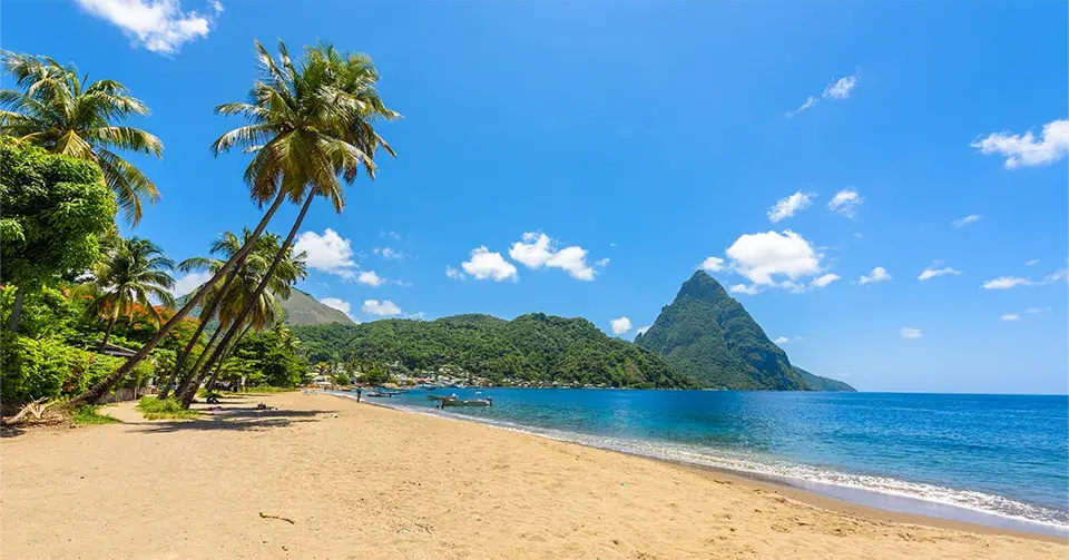 Soufriere Bay & Paradise beach, with a view of the Pitons in St Lucia
