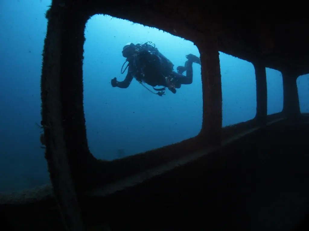 Diver in a wreck in Gozo