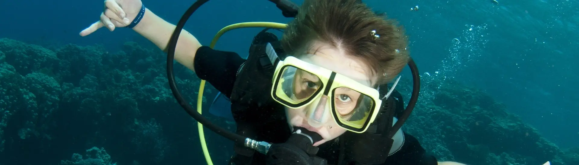 Young boy scuba diving