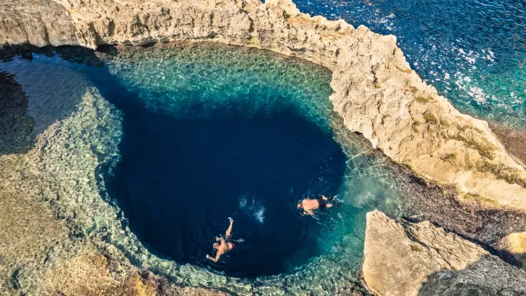Snorkellers in the Blue Hole, Gozo