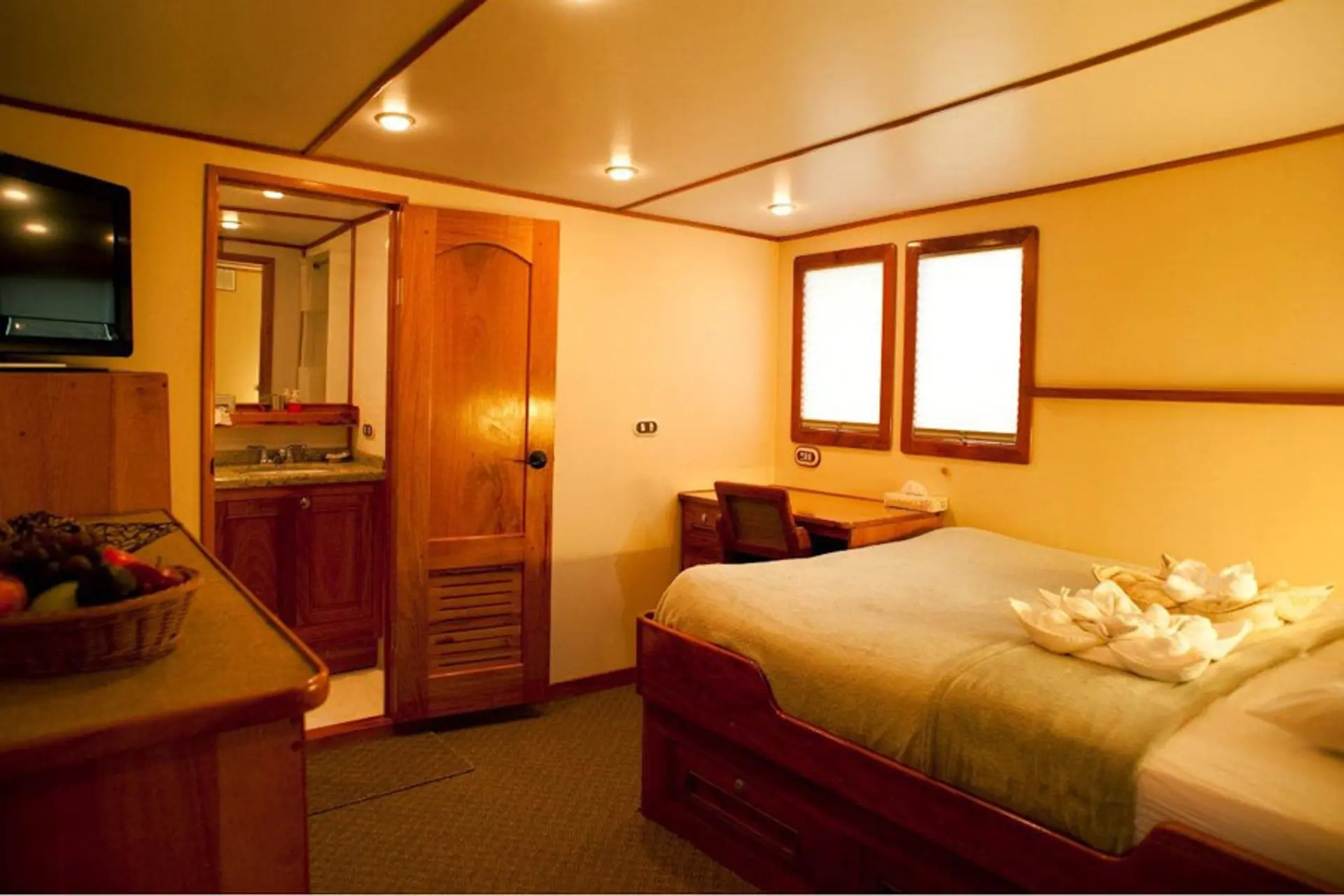 View of a double cabin and bathroom on Sea Hunter.