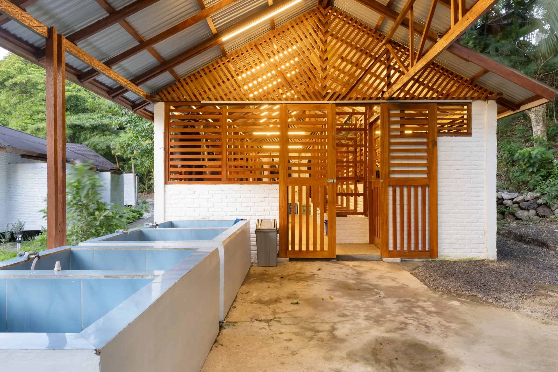 Rinse tanks outside the dive centre at White Sands Beach Resort in Lembeh, Indonesia