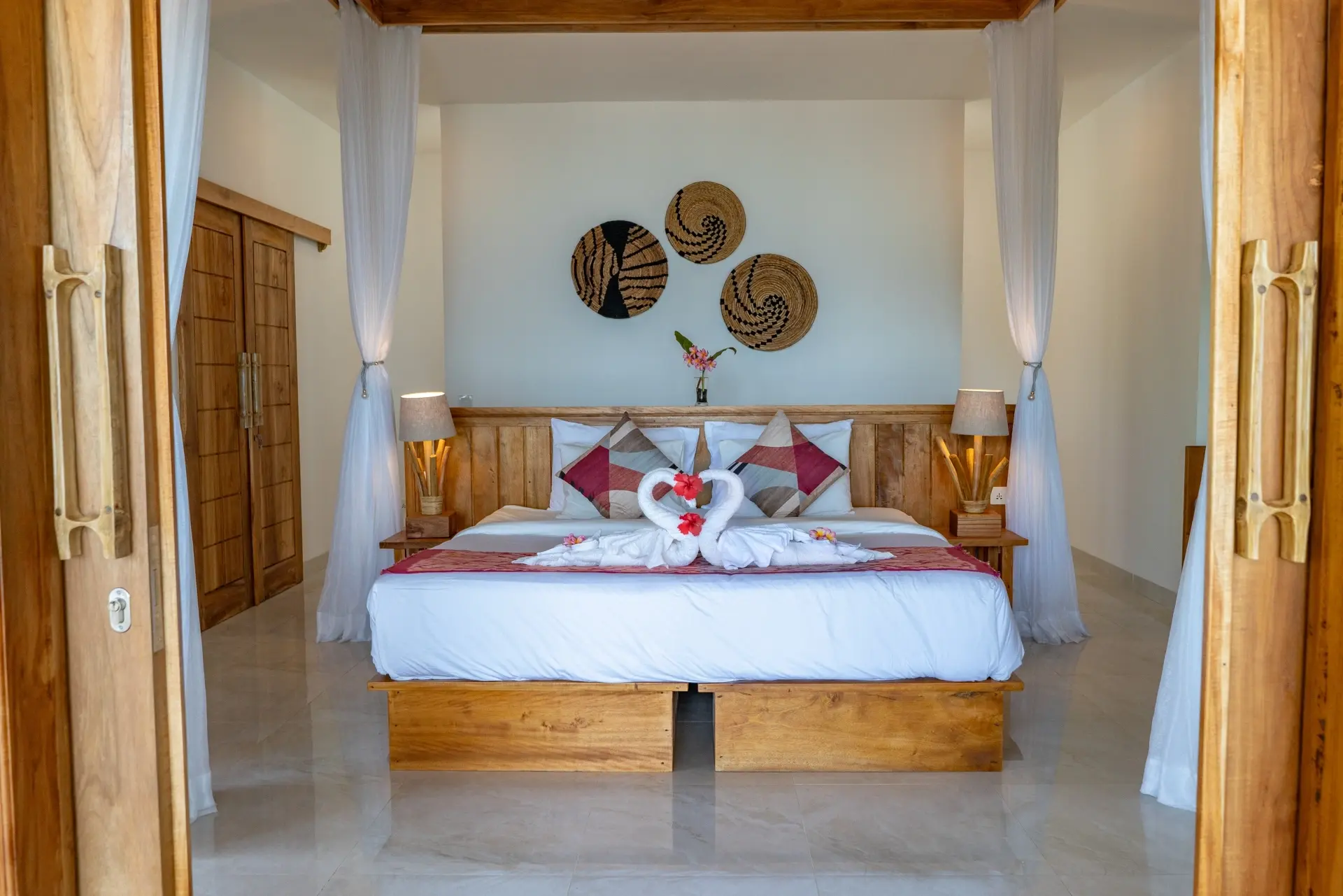 Premium oceanfront cottage bedroom at Murex Bangka Resort in Indonesia