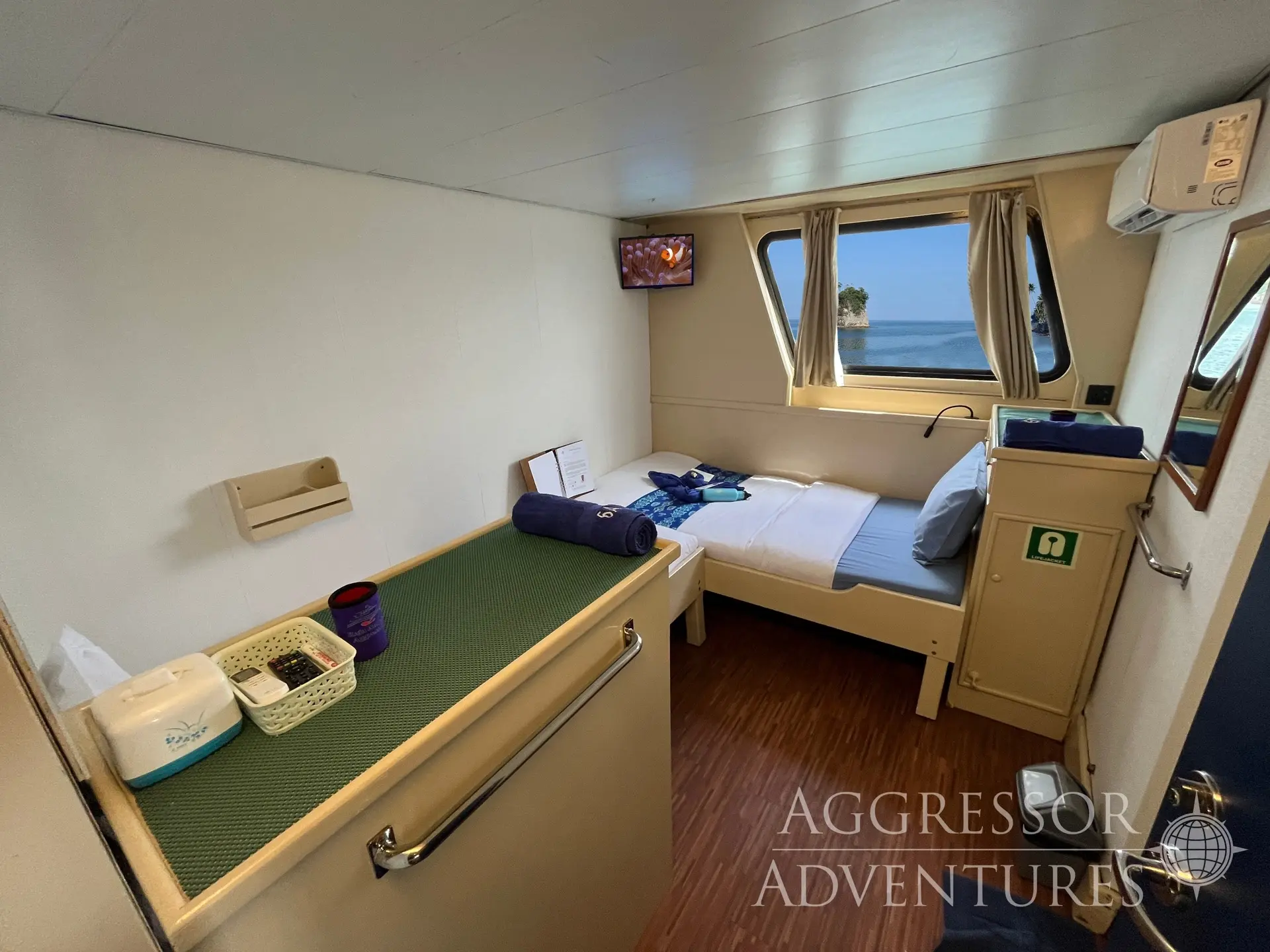 A deluxe twin cabin on Raja Ampat Aggressor.