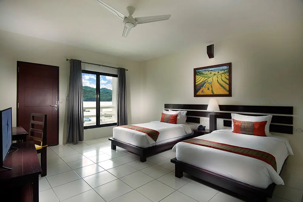 Deluxe twin bedroom at Solitude Lembeh Resort in Indonesia