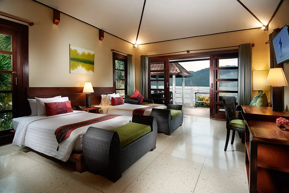 Twin bedroom in the seafront villa at Solitude Lembeh Resort in Indonesia