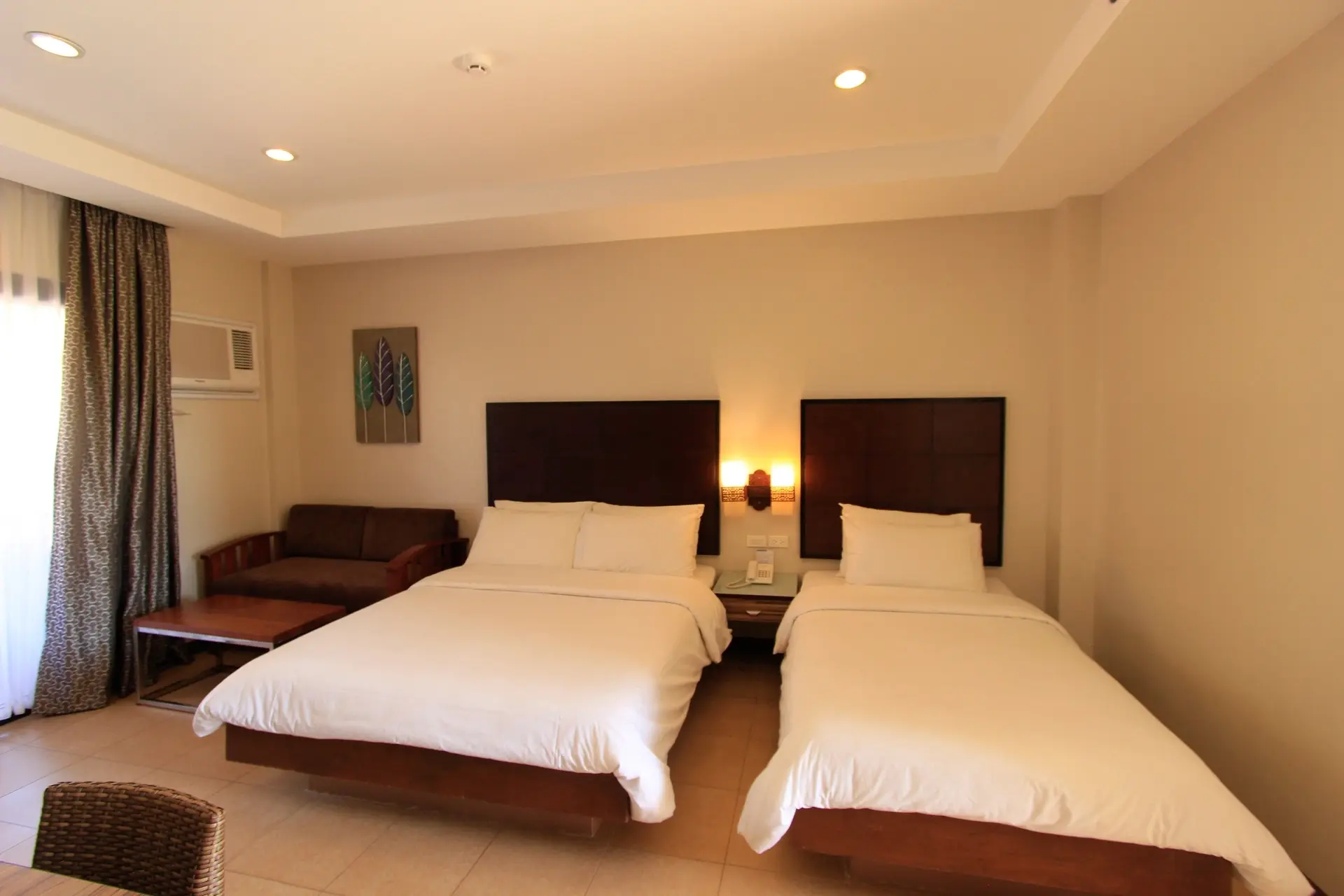 Twin beds at Westown Lagoon in Coron, the Philippines