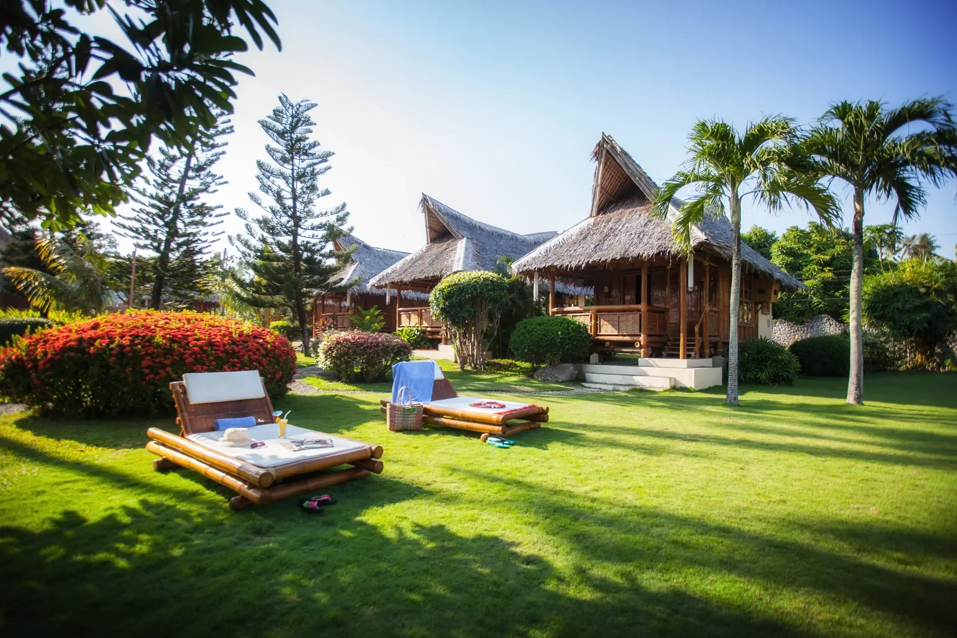 Sun loungers at Pura Vida Resort in Dauin, the Philippines