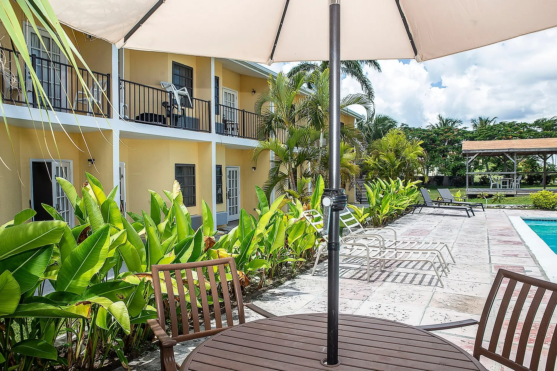 Terrace by the swimming pool at Orange Hill Inn in Nassau, the Bahamas