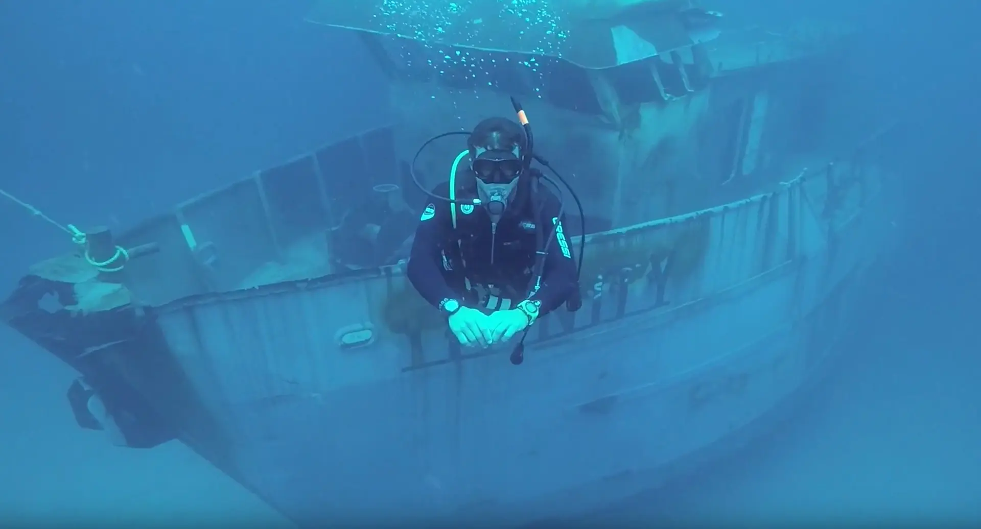 Diver exploring a shipwreck in Speyside, Tobago