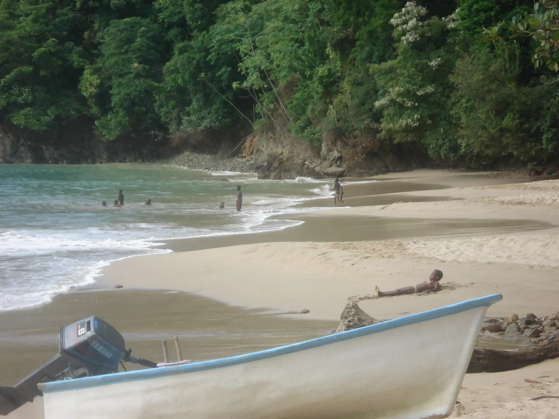 Boat on the beach near Nabucco's Resort Speyside Inn in Tobago, the Caribbean