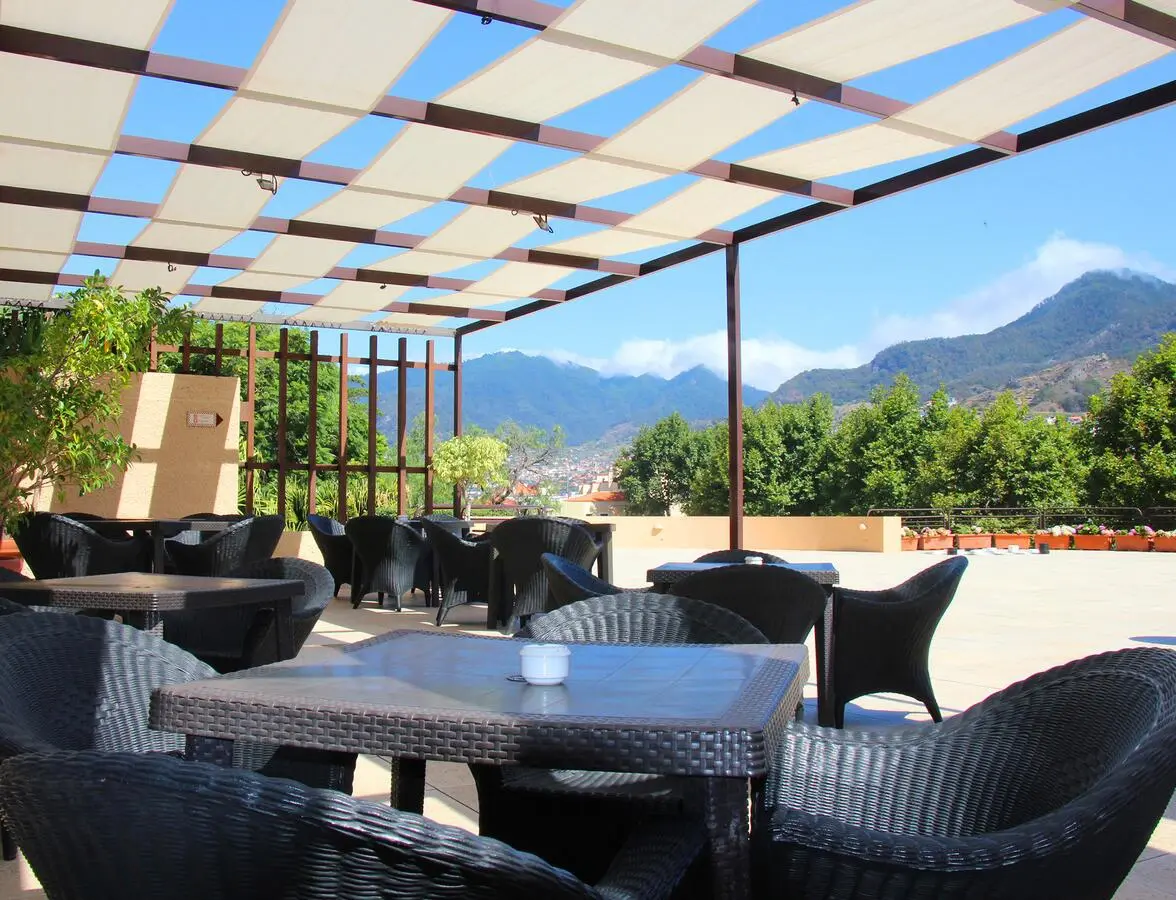 Outdoor dining at Hotel Dom Pedro in Madeira