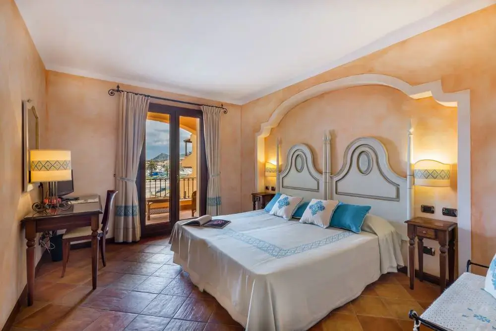 Classic bedroom at La Vecchia Fonte Hotel in Sardinia