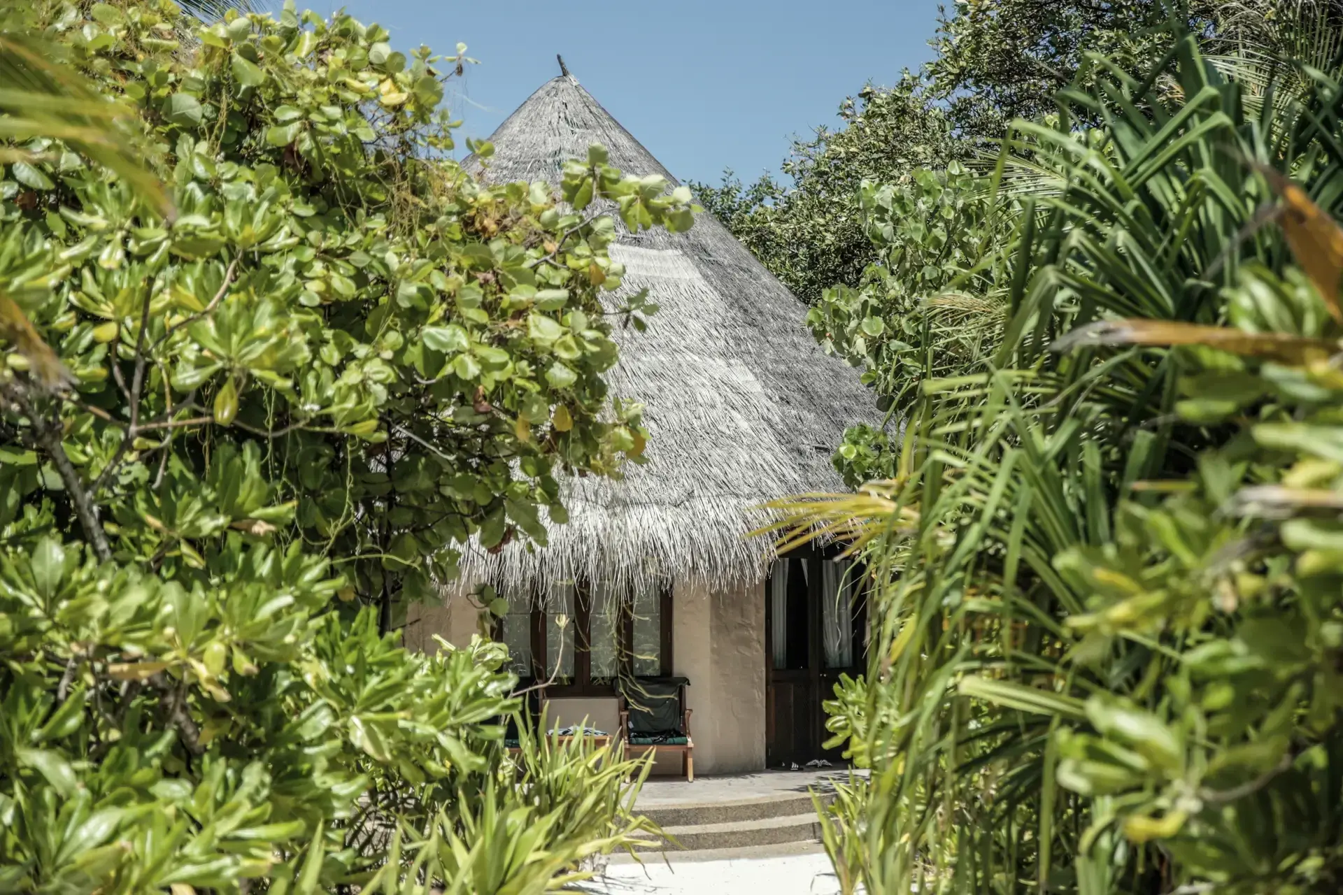 External view of a beach villa, at Coco Palm Dhuni Kolhu Resort, Maldives