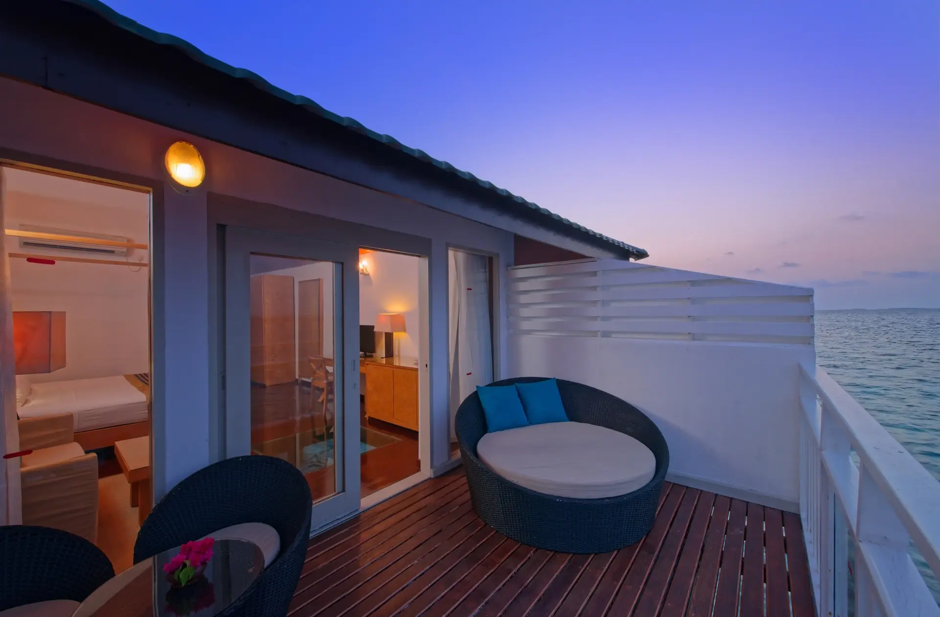 Overwater villa balcony at Embudu Village accommodation in the Maldives