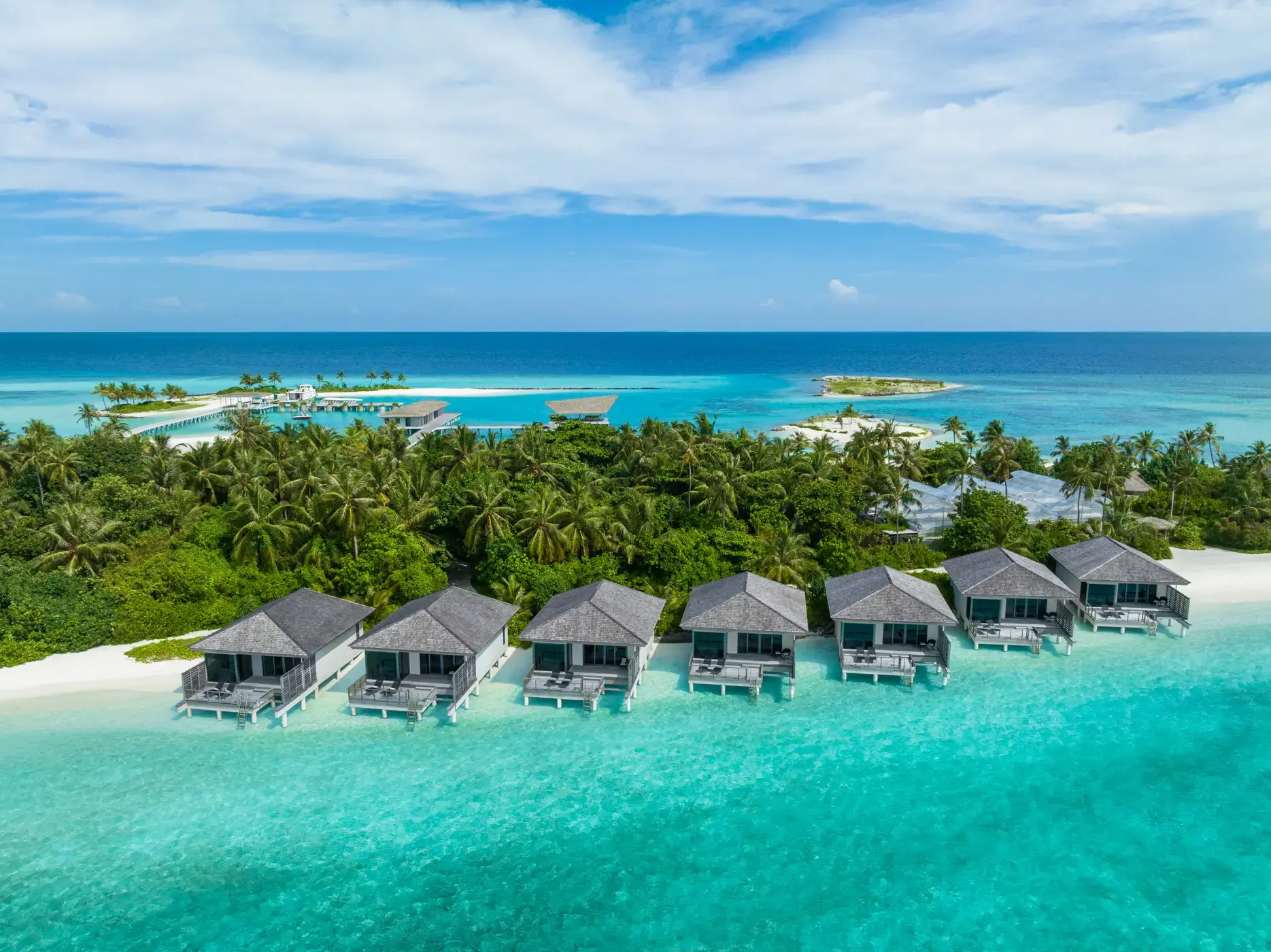 Aerial view of the lagoon villas at Le Meridien Maldives Resort & Spa, Maldives.