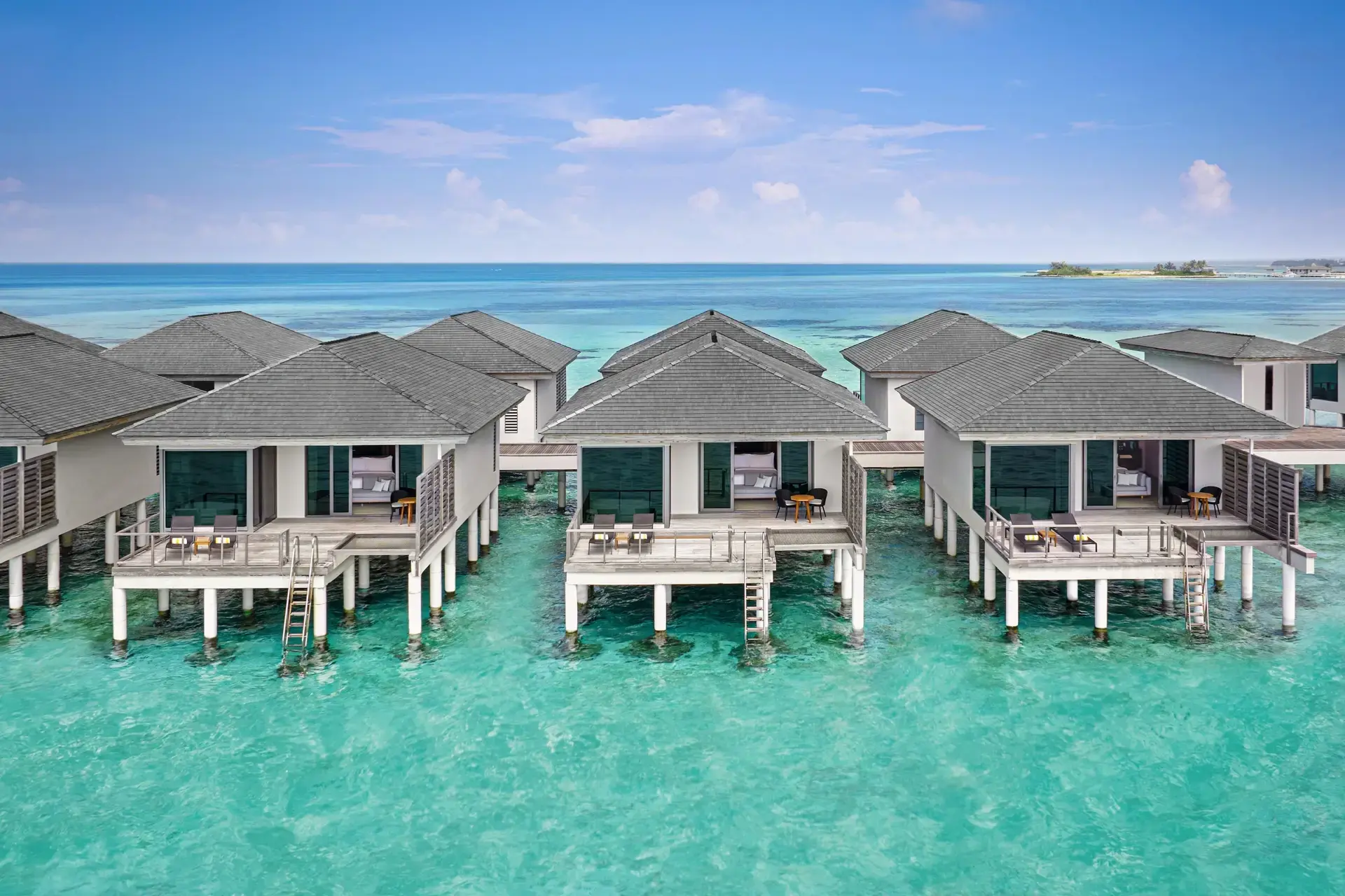 Aerial view of the over-water villas at Le Meridien Maldives Resort & Spa, Maldives.