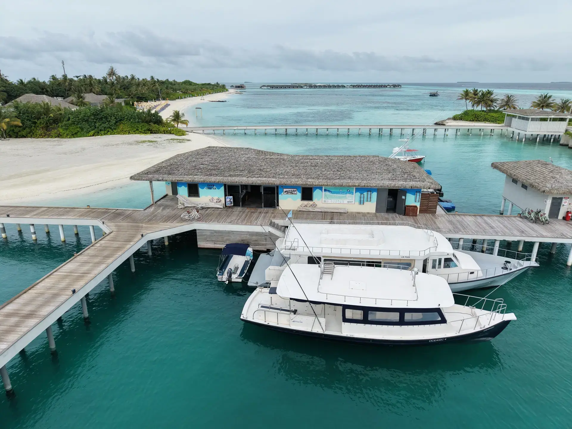 Aerial view of the Sub Oceanic Dive Centre dive boats, at Le Meridien Maldives Resort & Spa, Maldives.
