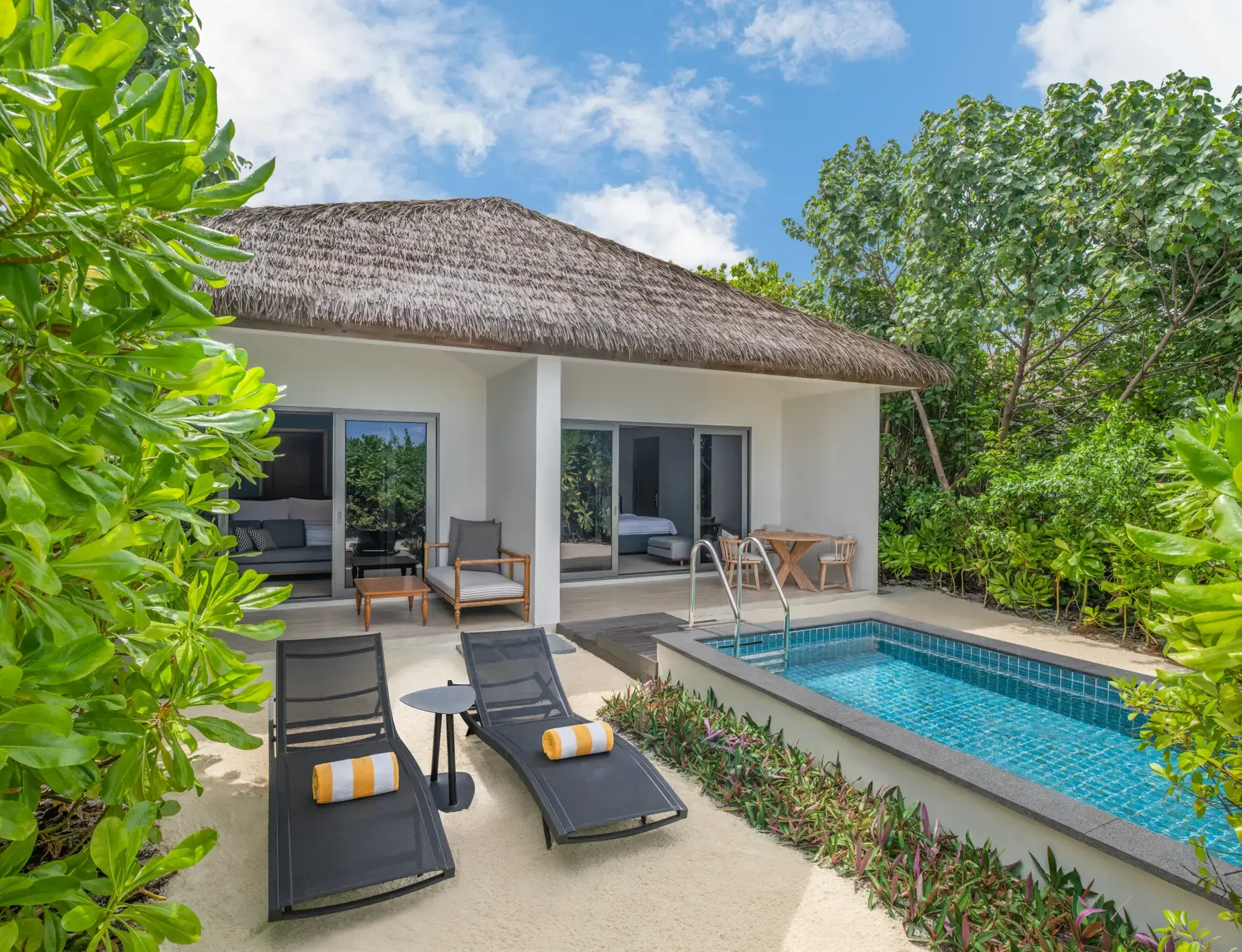 Exterior of a two-bedroom beach pool villa at Le Meridien Maldives Resort & Spa, Maldives.