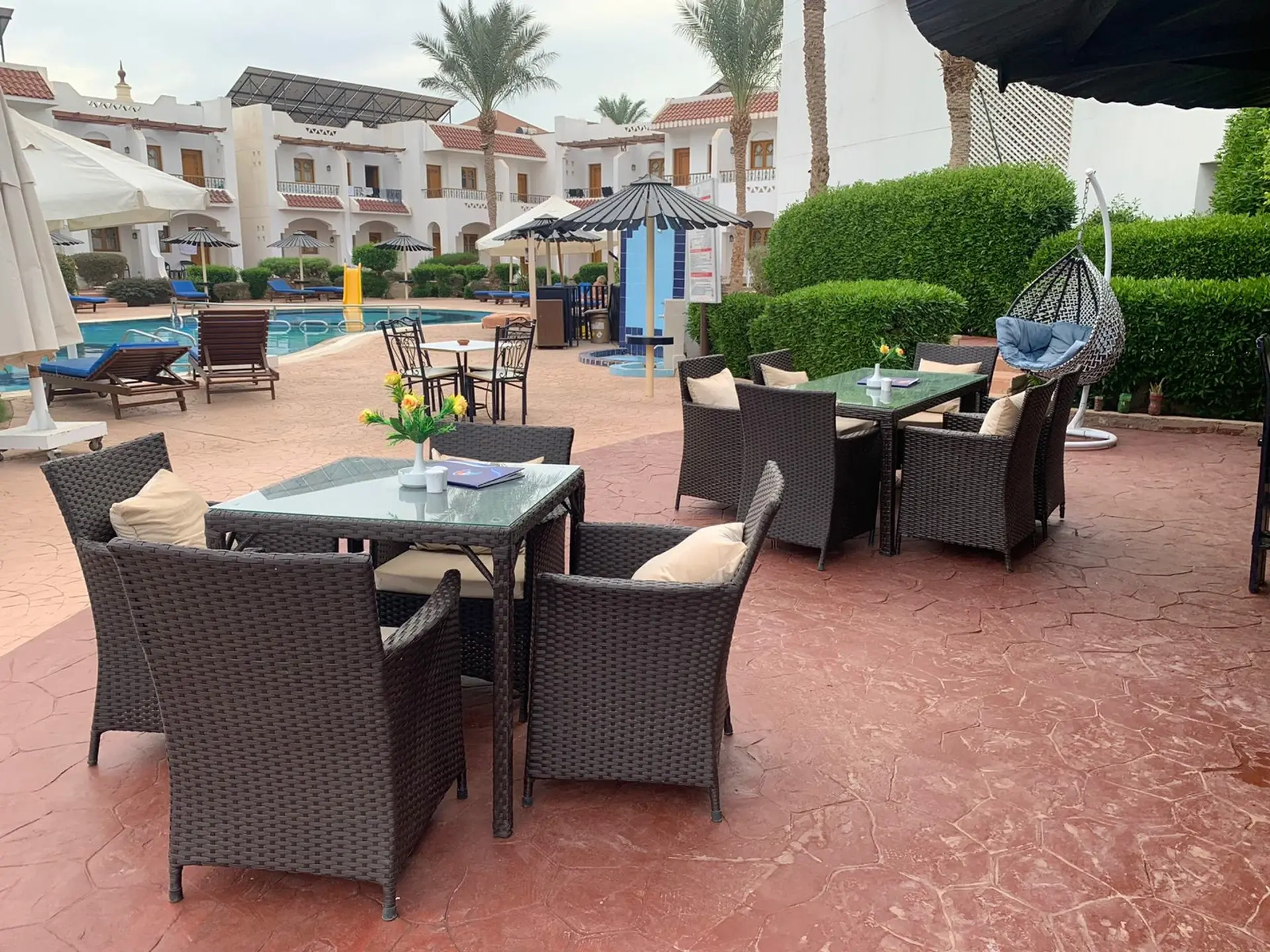 Poolside area at Dive Inn Hotel in Ras Um Sid, Sharm El Sheikh, Egypt