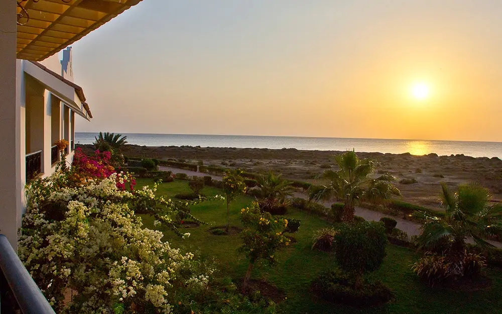 View of the sunset over Lahami Bay Beach Resort in Hamata, Egypt
