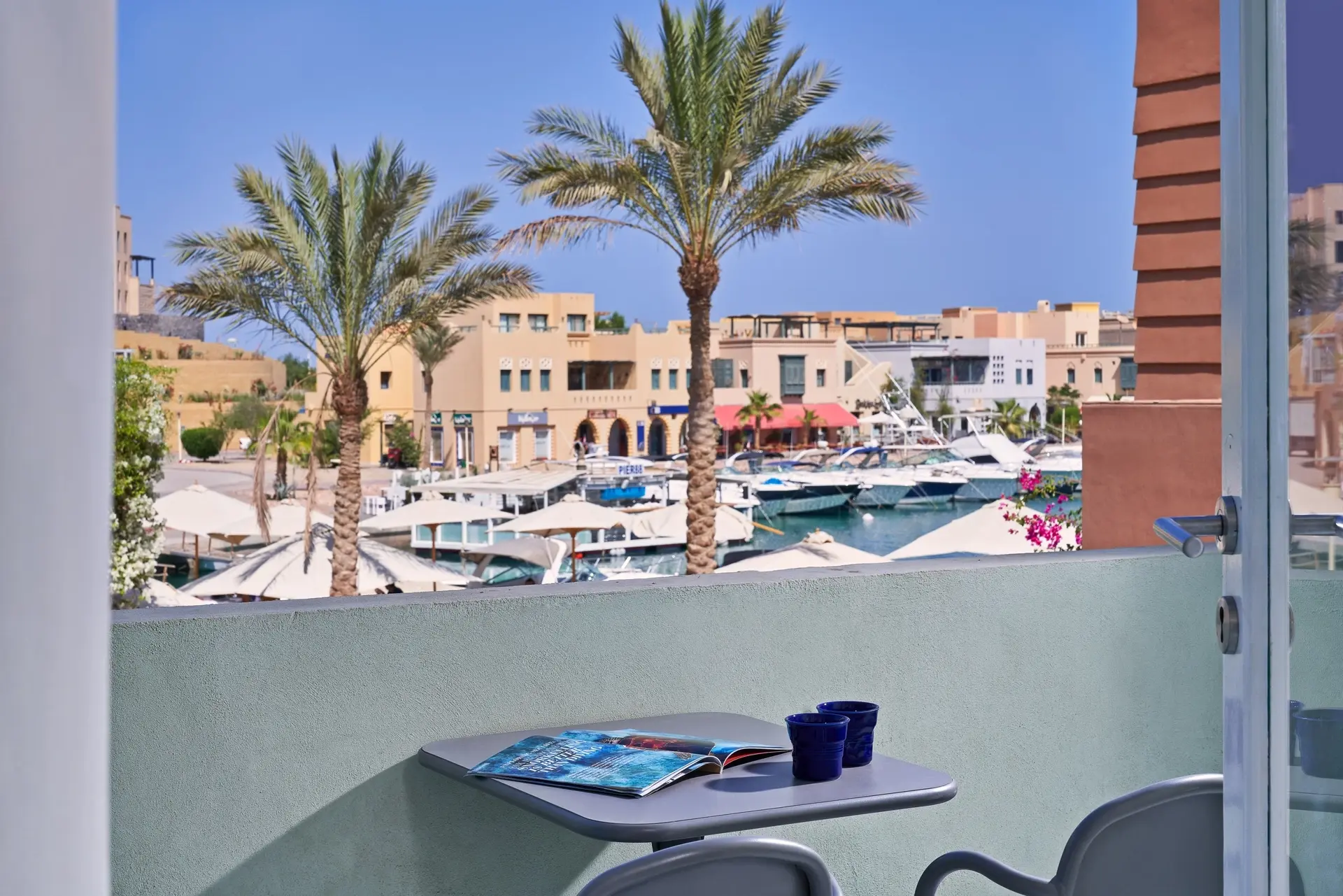 View of the marina from the terrace in the water room at Turtle's Inn hotel in El Gouna, Egypt