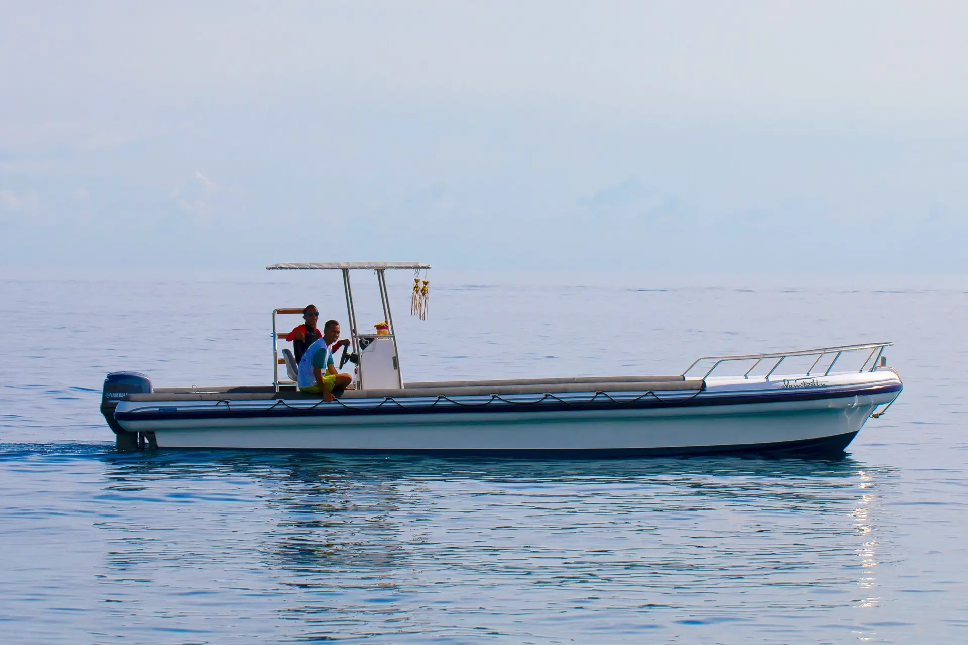 Dive boats at Alam Batu in Bali, Indonesia