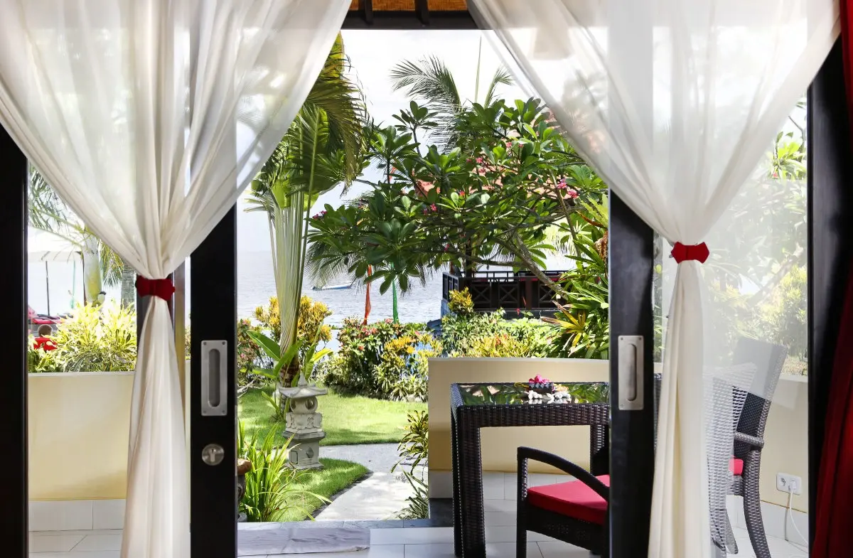View from bungalow towards the sea at Teluk Karang Resort in Bali, Indonesia