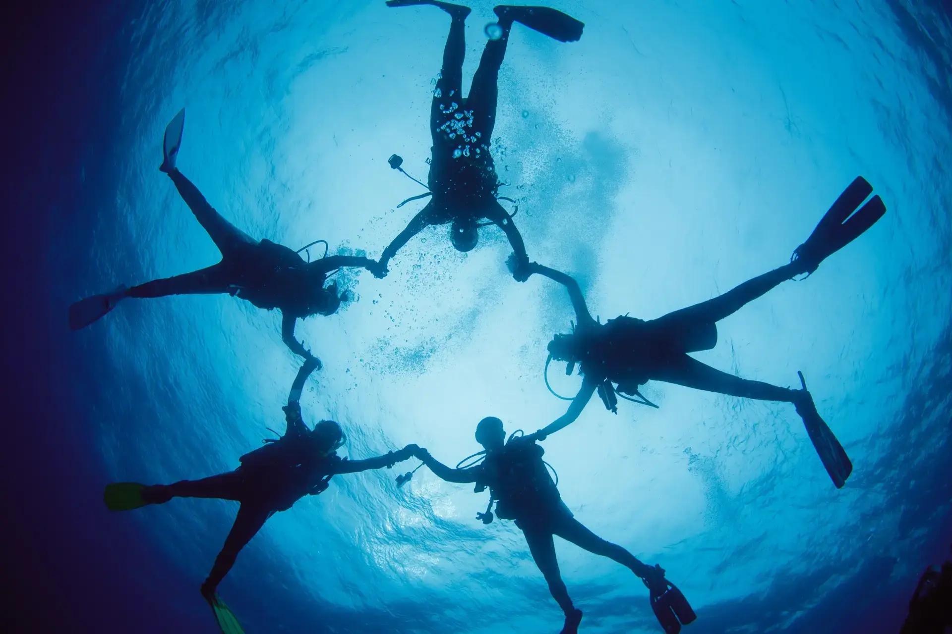 Divers in a star position in Thailand