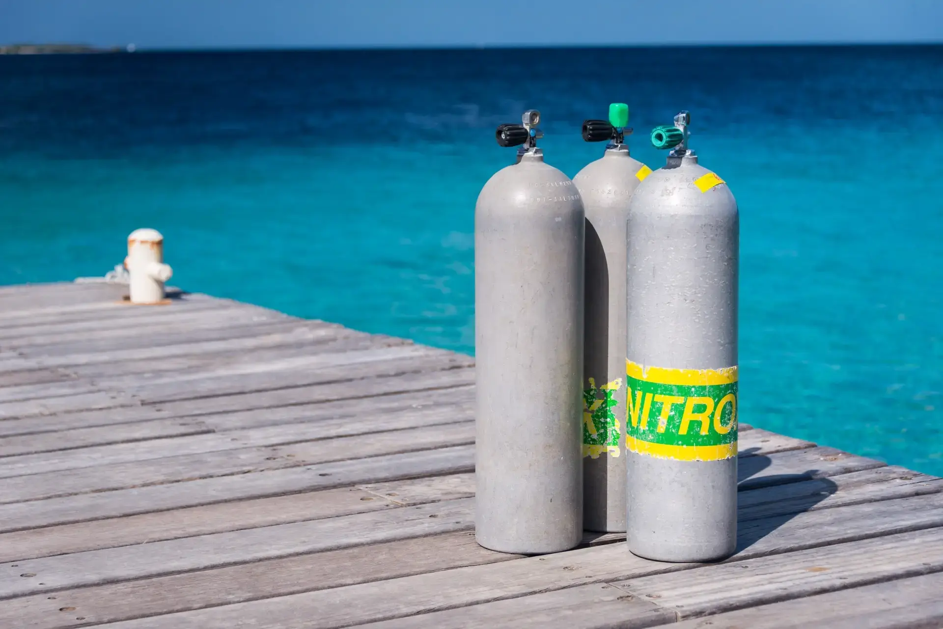 Nitrox bottles on a pier