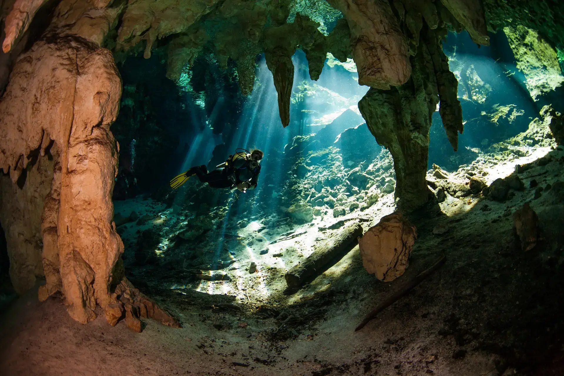 Underwater diver in the Cenotes, Mexico