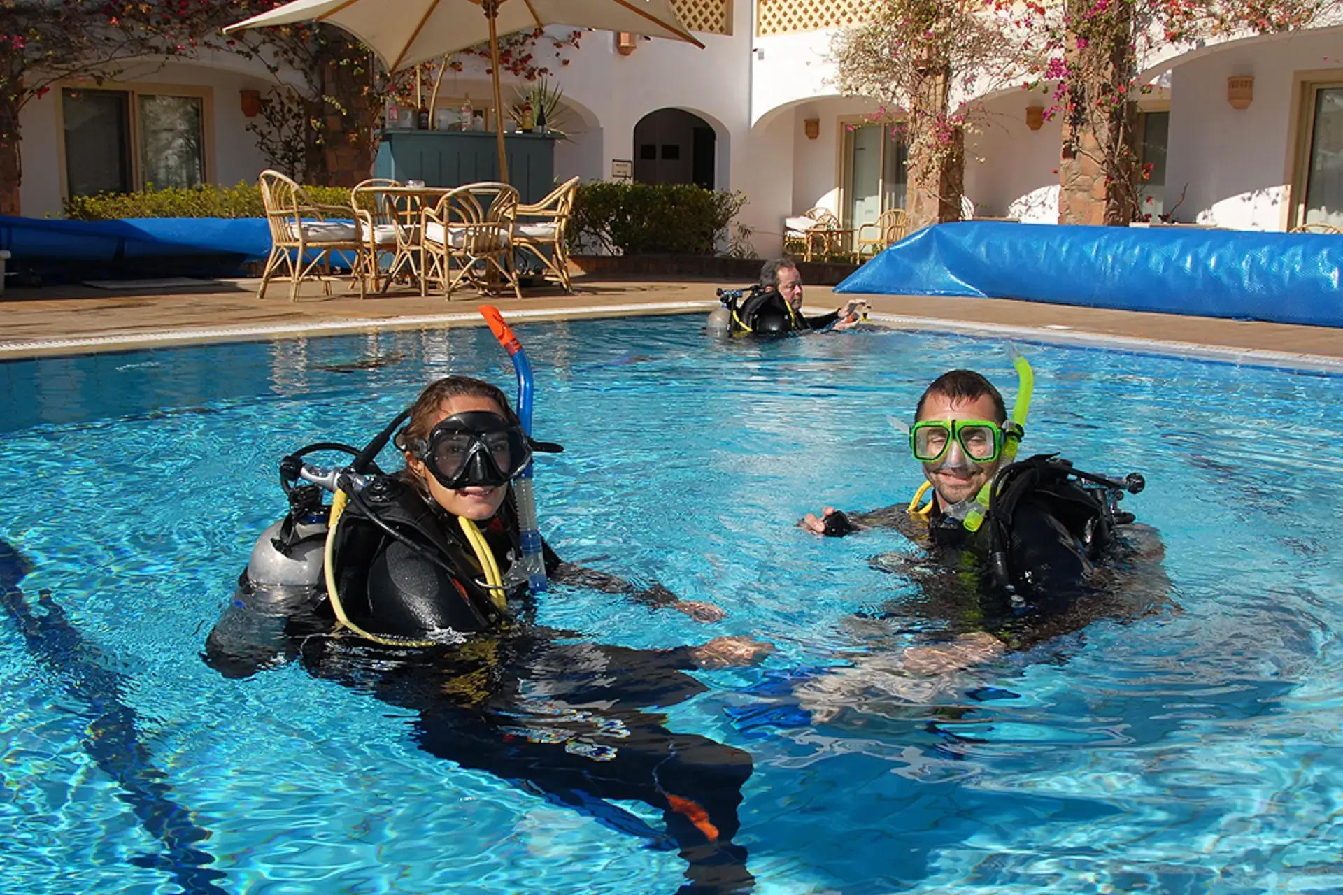 Learning to dive in a swimming pool, Egypt