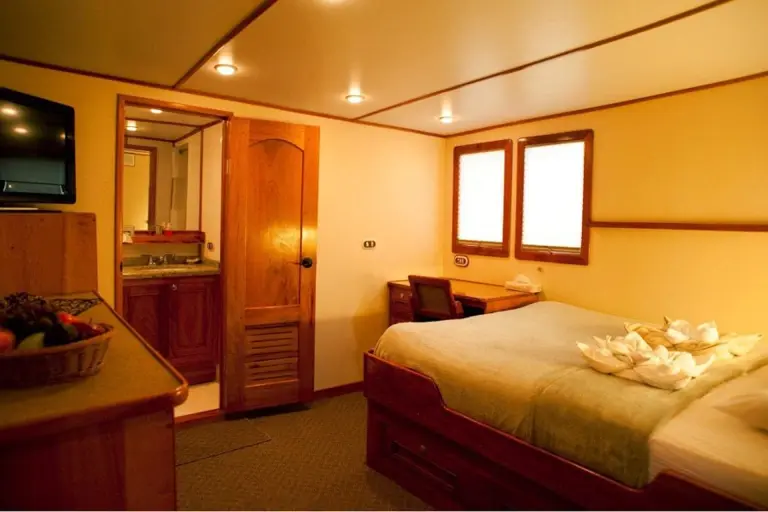 View of a double cabin and bathroom on Sea Hunter.