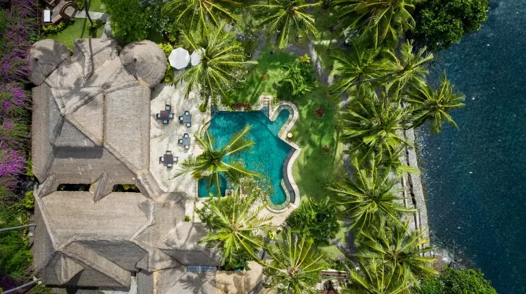 Aerial of the swimming pool at Alam Anda Ocean Front Resort & Spa in Bali, Indonesia