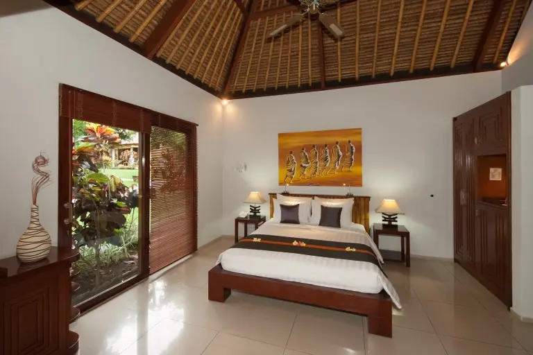 Superior bungalow bedroom at Siddhartha Ocean Front Resort & Spa in Bali, Indonesia