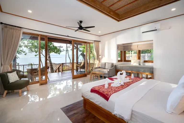 Oceanfront villa bedroom at Murex Manado in Indonesia