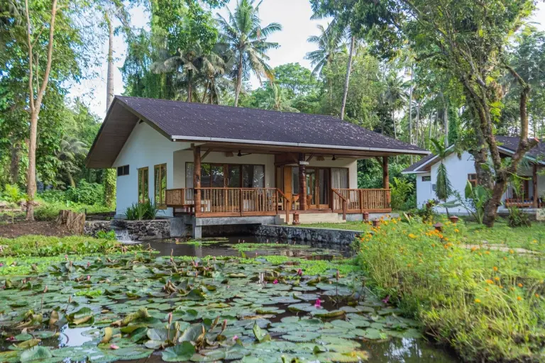 Premium deluxe cottage & pond at Murex Manado Resort in Indonesia