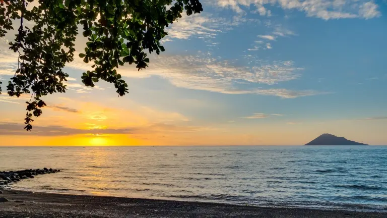 Sunset over the beach at Murex Manado Resort in Indonesia