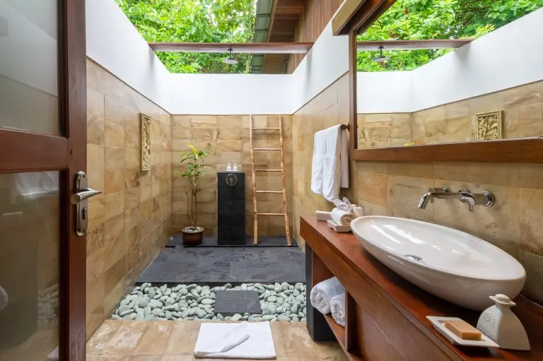 Garden view villa bathroom at Siladen Resort & Spa in Indonesia