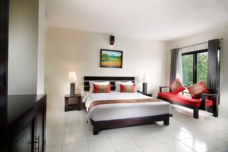 Deluxe double bedroom at Solitude Lembeh Resort in Indonesia