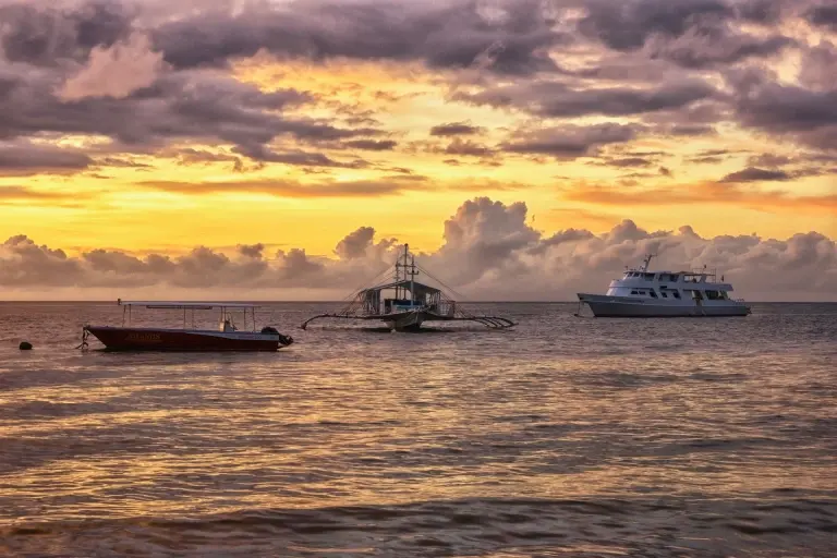 Dive boats at Atlantis Dive Resort in Dumaguete, the Philippines