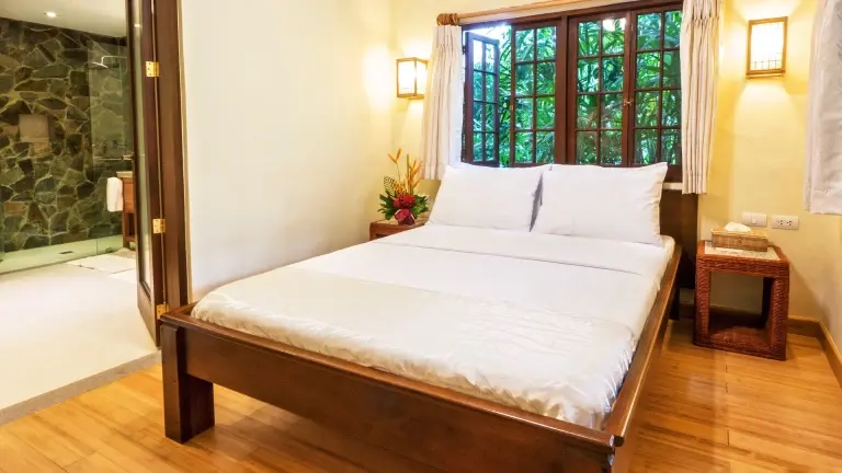 Premier suite queen bedroom at Atlantis Dive Resort in Dumaguete, the Philippines