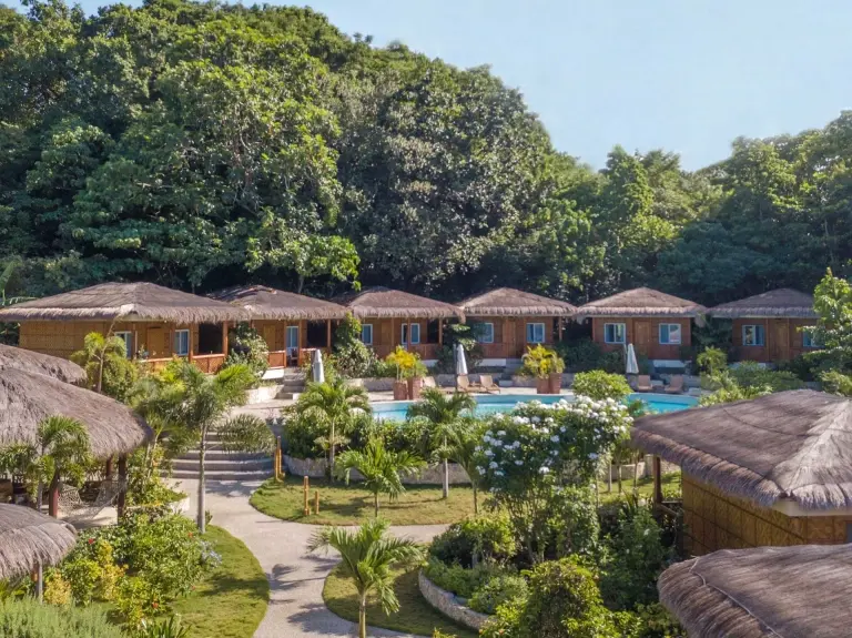 Bungalows & swimming pool at Magic Oceans Resort in Bohol, the Philippines